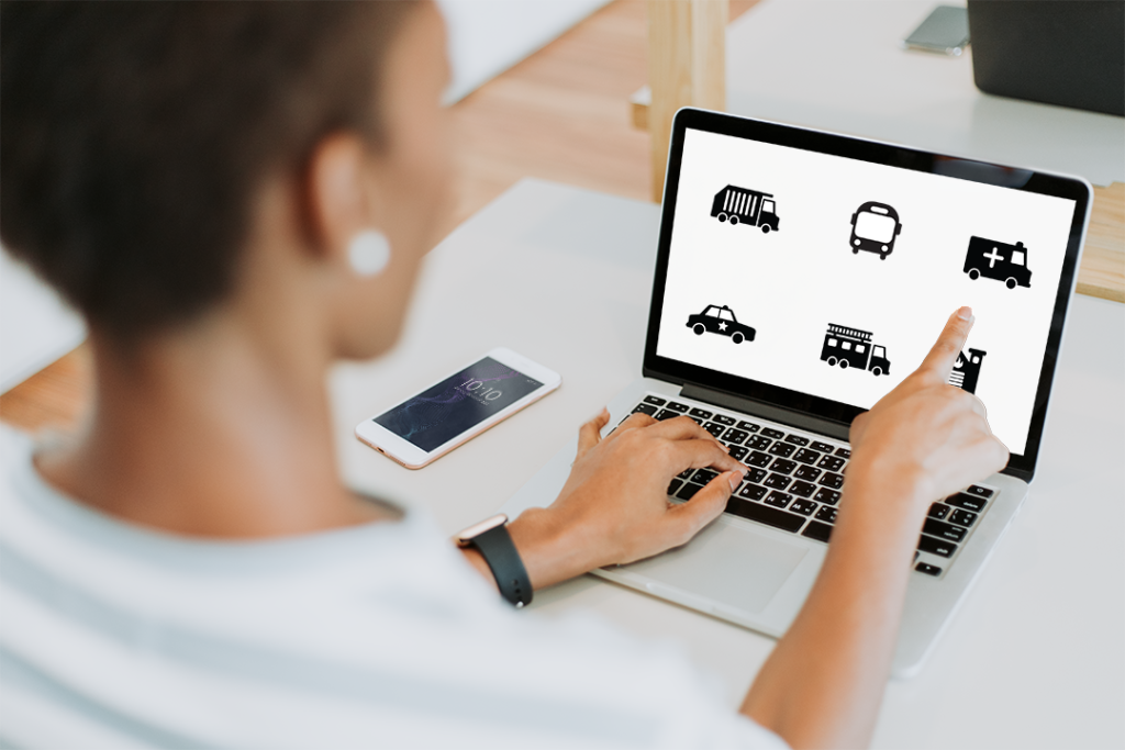 Black woman pointing at computer screen